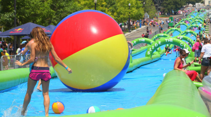 Photo: Slide the City - Epic Slip & Slides that take over a street