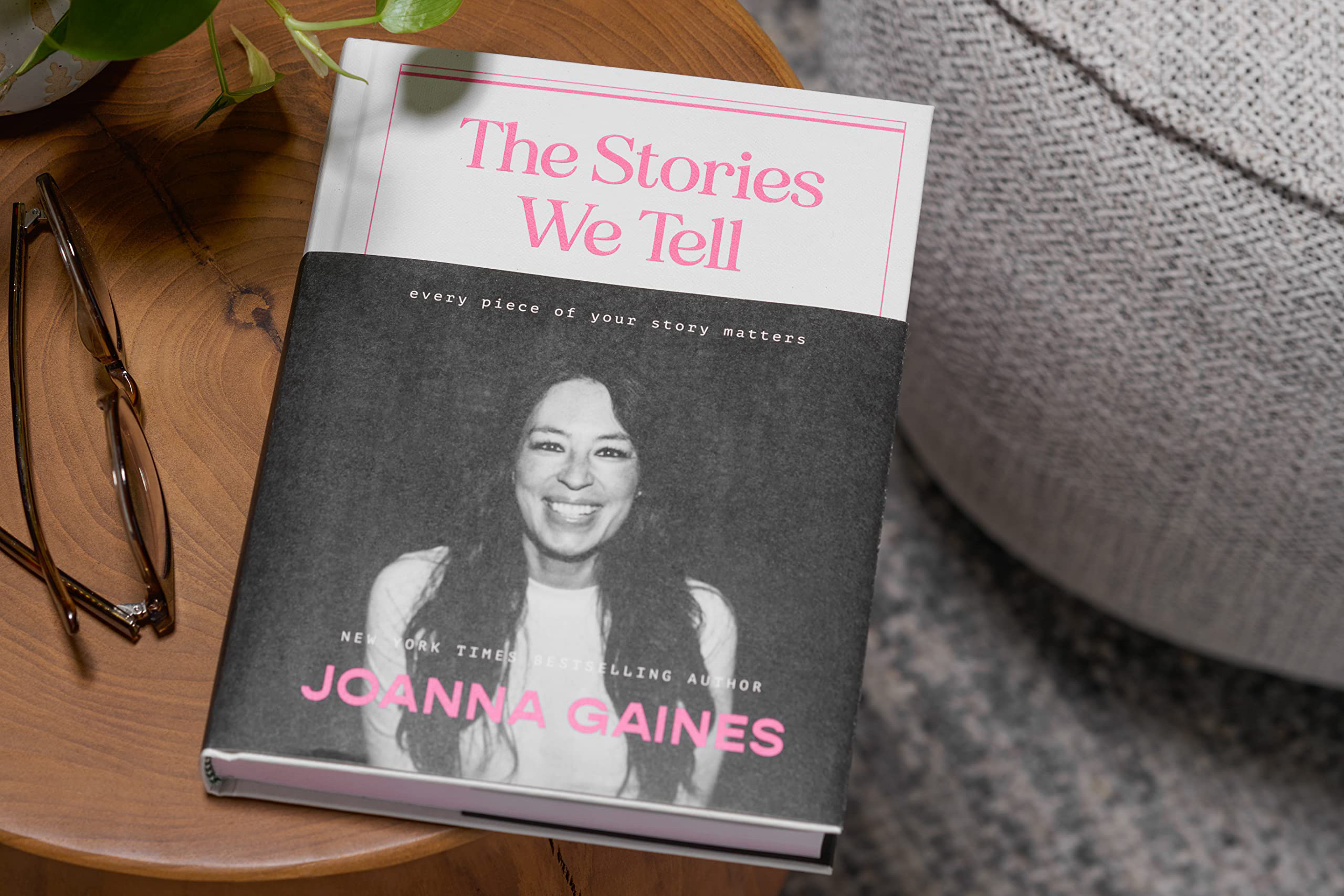 Joanna Gaines's memoir sits on table next to glasses