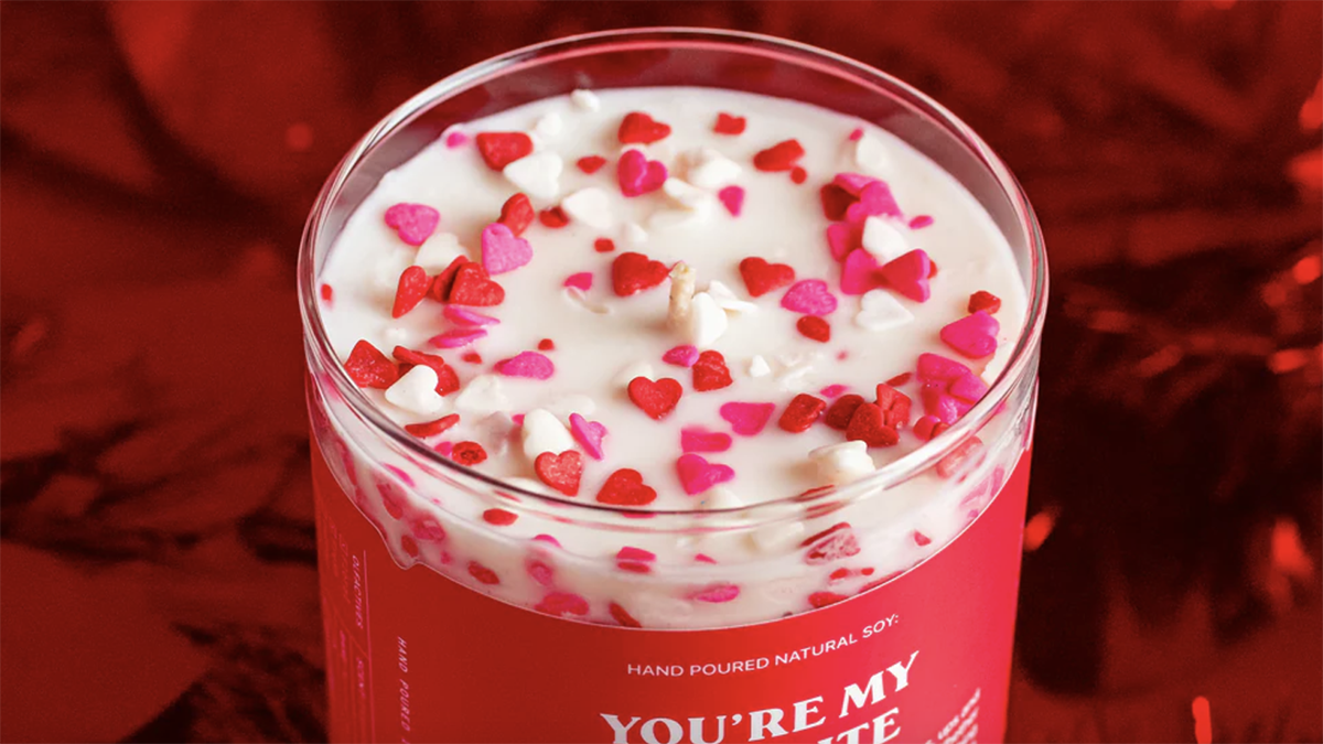 valentine's day candle with wax hearts on top
